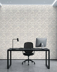 Silver Eddy soft grey abstract swirl wallpaper as a feature wall in a bright home office