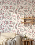 Silver & Berry modern red botanical wallpaper in a warm and inviting living room