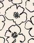 Minimalist black and ivory floral wallpaper with bold hand drawn flower outlines and clustered dotted centers.