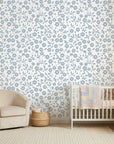 Sky Bloom serene blue floral peel and stick wallpaper adding character to a cozy bedroom