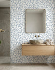 Sky Bloom serene blue floral peel and stick wallpaper creating ambiance in a serene bathroom