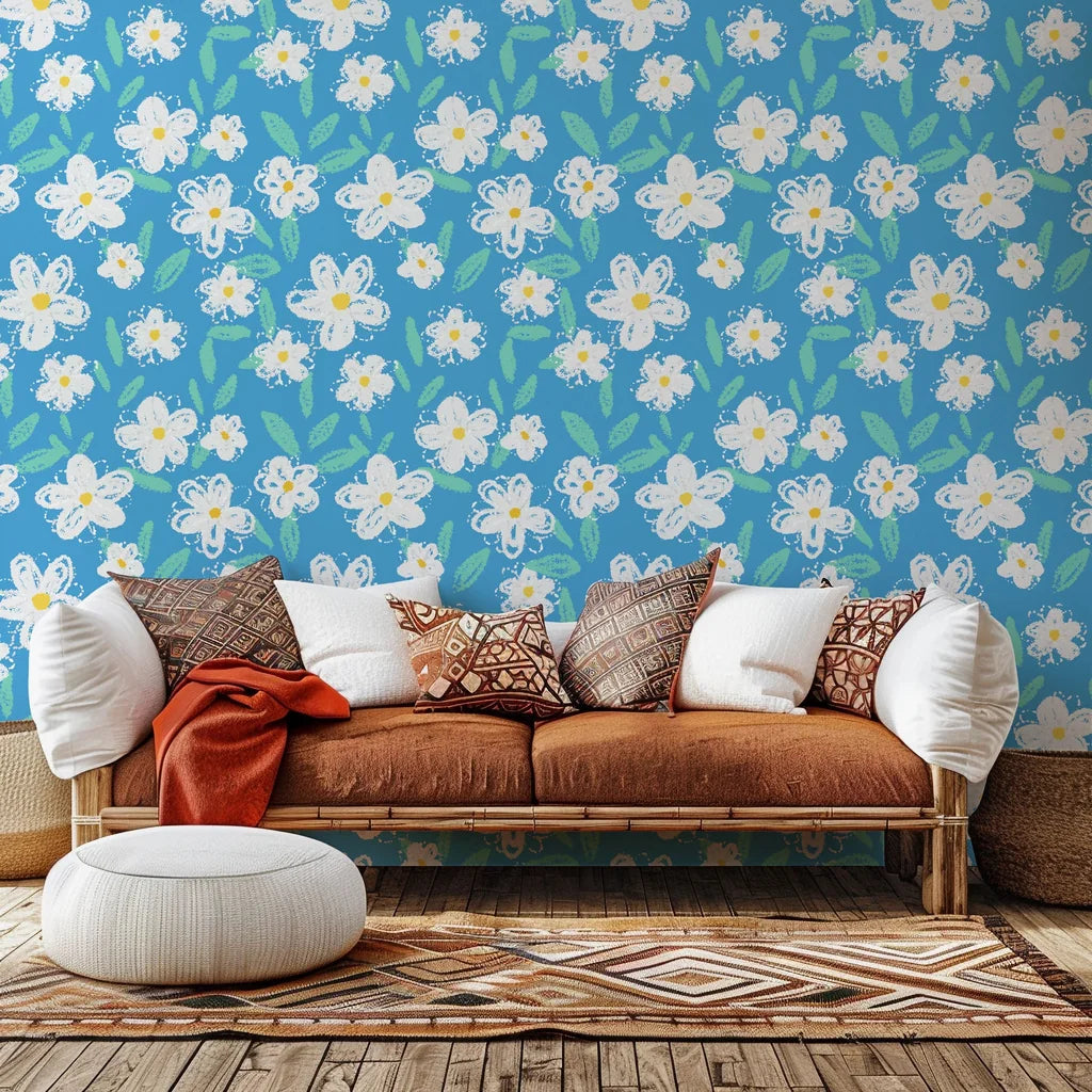 White chalk-sketch daisies printed on a vibrant blue wallpaper