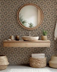 Self-adhesive wall covering featuring an architectural, geometric pattern in black and brown tones, named Sliced Radiance