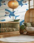 A playful, banded wallpaper featuring mischievous blue sharks with a wink in an aquatic setting