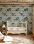 Soft azure wall covering showcasing a recurring shark and line motif with a convenient peel-and-stick backing. - Smiling Jaws