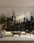 Smoke & Shadow wallpaper mural featuring monochrome cityscape with illuminated skyscrapers in modern living room