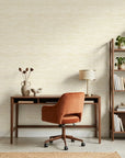 Soft Citrus textured gold abstract wallpaper as a feature wall in a bright home office