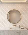 Soft Geometry peach and grey abstract wallpaper creating ambiance in a serene bathroom