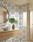Soft Petal Rhapsody blue grey classic damask wallpaper creating ambiance in a serene bathroom