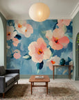 Watercolor floral Soft Scatter wallpaper with coral and white blooms on blue background in modern living room
