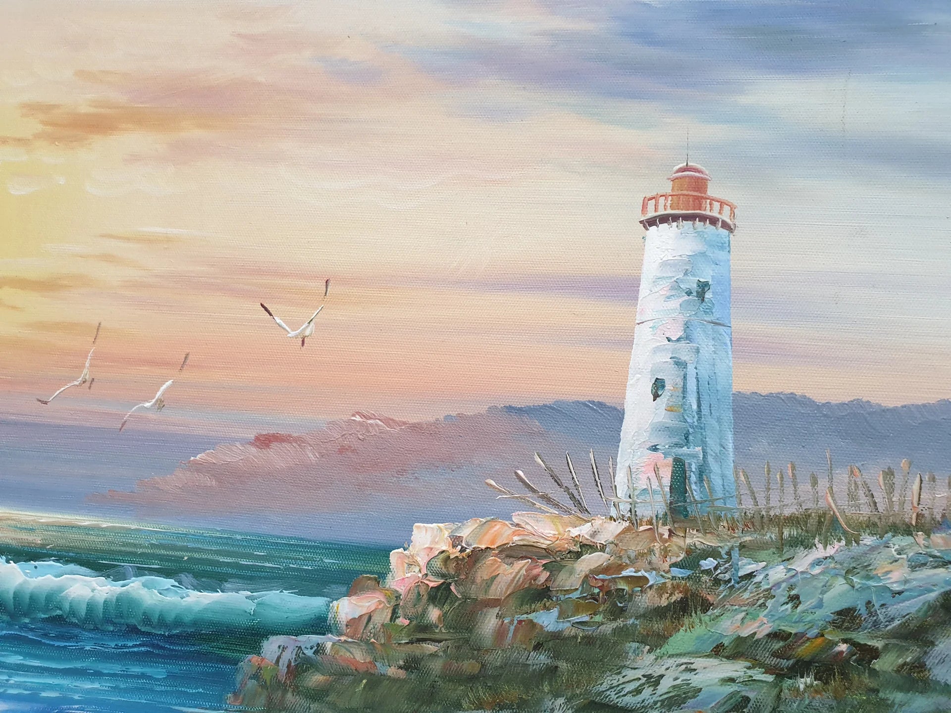 Soft Vigil coastal sunset lighthouse wallpaper creating ambiance in a serene bathroom