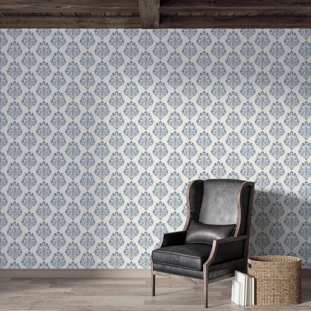 Blue and cream damask Soft Petal Rhapsody wallpaper in rustic living room with leather chair