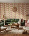 Soft Petal Wash romantic pink floral wallpaper in a warm and inviting living room