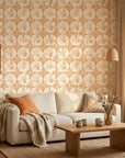 Solar Ritual peach and beige floral wallpaper in a warm and inviting living room
