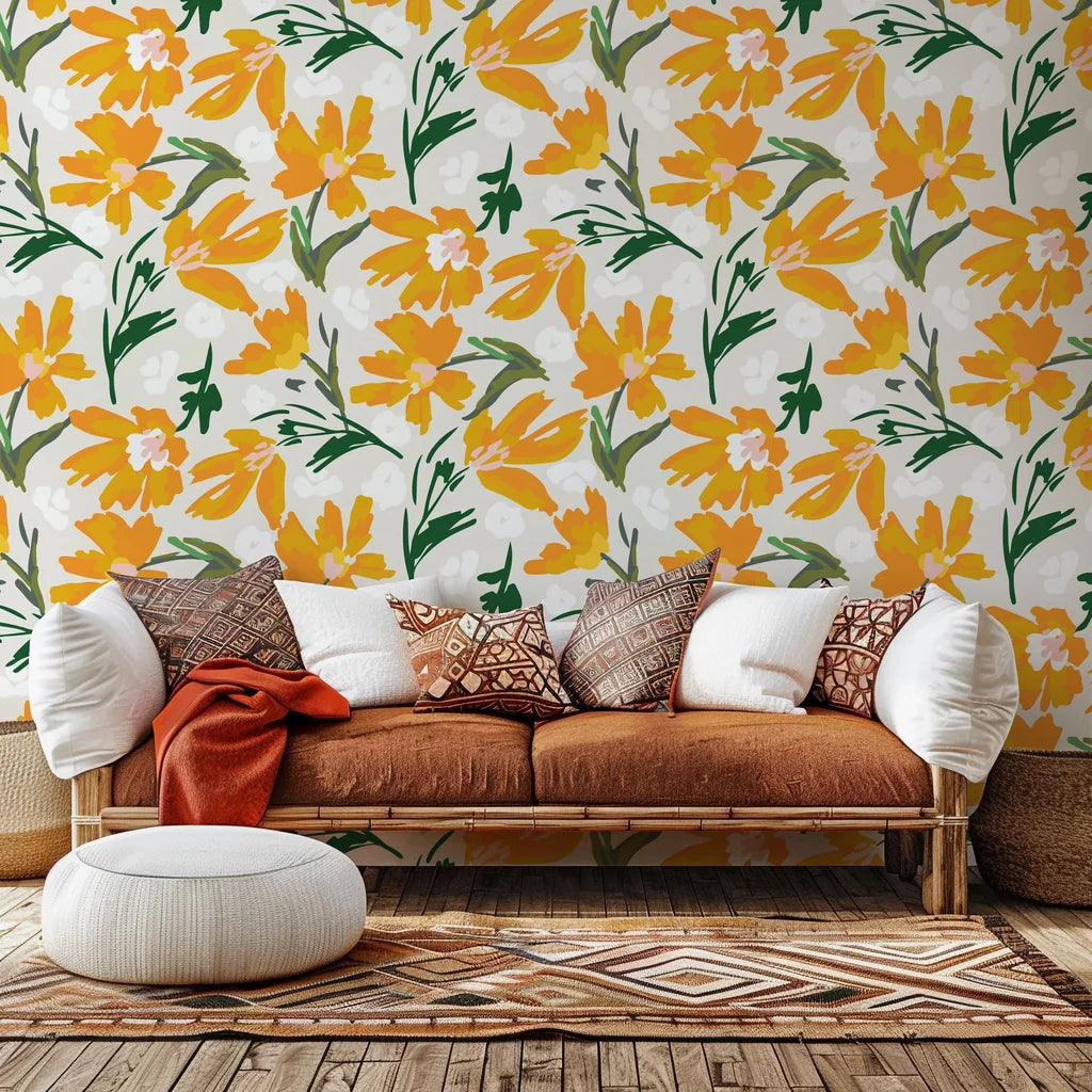 Self-adhesive wallpaper featuring a vibrant orange and yellow painterly floral design, known as Solar Bloom
