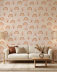 Solstice Rite boho terracotta rainbow moon wallpaper in a warm and inviting living room