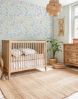 Vibrant school-themed symbols and learning tools arranged in a neat, repeating matrix on peel-and-stick wallcovering. - Spark Scribbles