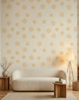 Spun Gold golden sun spiral wallpaper in a warm and inviting living room