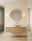 Spun Gold golden sun spiral wallpaper creating ambiance in a serene bathroom