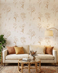 Stardust Field golden botanical wildflower wallpaper in a warm and inviting living room