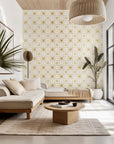 White peel and stick wallpaper featuring a gold geometric star tile pattern labeled Starlight Geometry