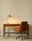 Starlight Geometry gold geometric star wallpaper as a feature wall in a bright home office