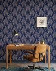 Starlit Swirl vibrant navy and gold dot pattern wallpaper adding character to a cozy bedroom