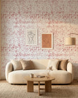 Static Field red abstract peel and stick wallpaper in a warm and inviting living room