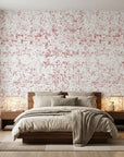 Static Field red abstract peel and stick wallpaper adding character to a cozy bedroom
