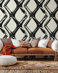Peel and stick wallpaper featuring an abstract, black and white distorted geometric grid pattern, named Static Quake.