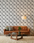 Steel Forms bold bauhaus geometric wallpaper in a warm and inviting living room