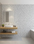 Steel Forms bold bauhaus geometric wallpaper creating ambiance in a serene bathroom