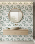 Still Green serene botanical peel and stick wallpaper creating ambiance in a serene bathroom