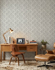 Still Labyrinth grey geometric peel and stick wallpaper as a feature wall in a bright home office