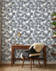 Still Morning blue and grey botanical wallpaper as a feature wall in a bright home office