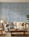 Storm Weave blue and grey abstract wallpaper in a warm and inviting living room