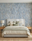 Storm Weave blue and grey abstract wallpaper adding character to a cozy bedroom