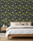 Storybook Forest navy folk woodland wallpaper adding character to a cozy bedroom