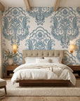 Sunlit Thicket blue floral damask wallpaper adding character to a cozy bedroom