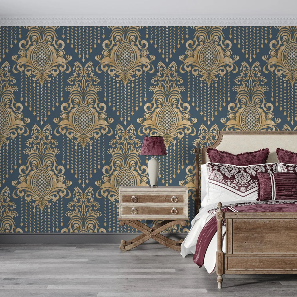 Navy and gold Sweet Pea Shadows damask wallpaper with ornate scrollwork in elegant bedroom setting