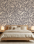 Swirling Echoes fluid foliage wallpaper adding character to a cozy bedroom
