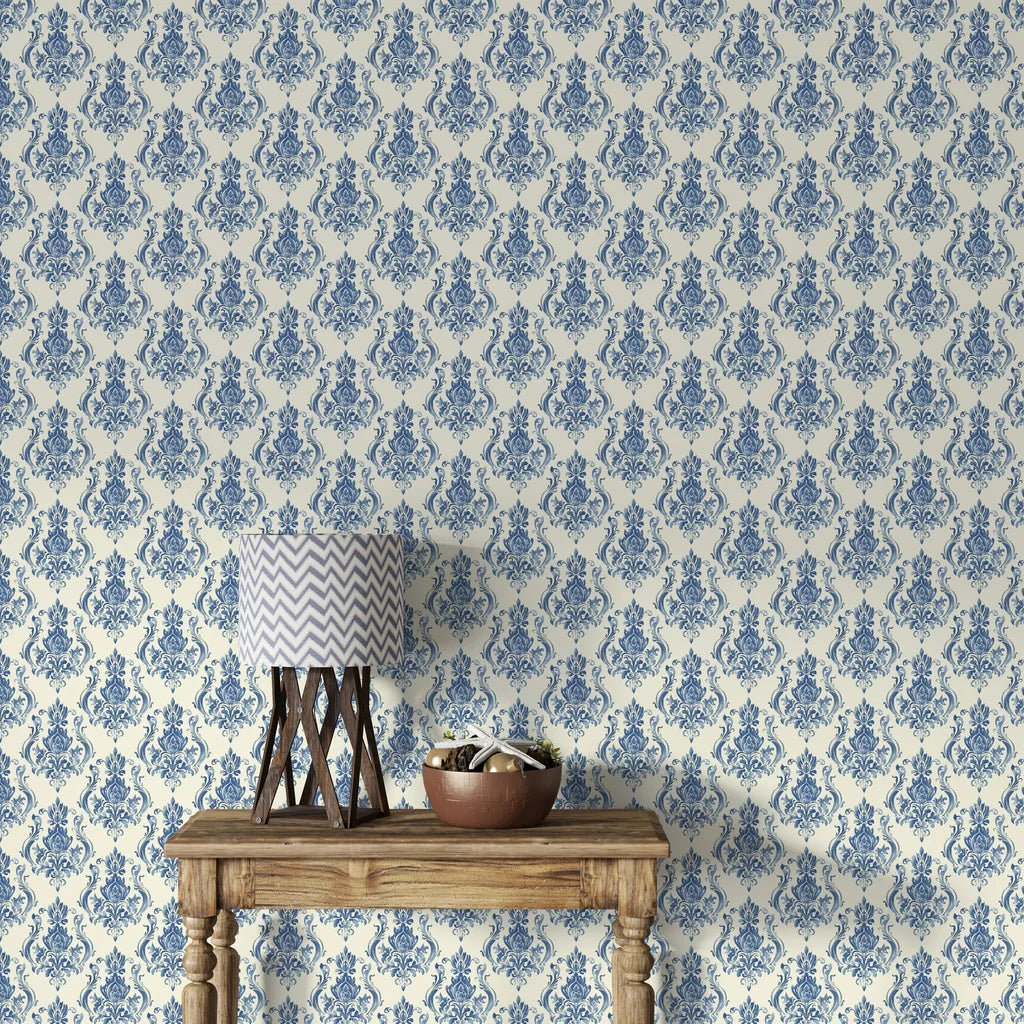 Blue and cream Sylvan Elegance damask wallpaper with ornate baroque motifs on ivory background