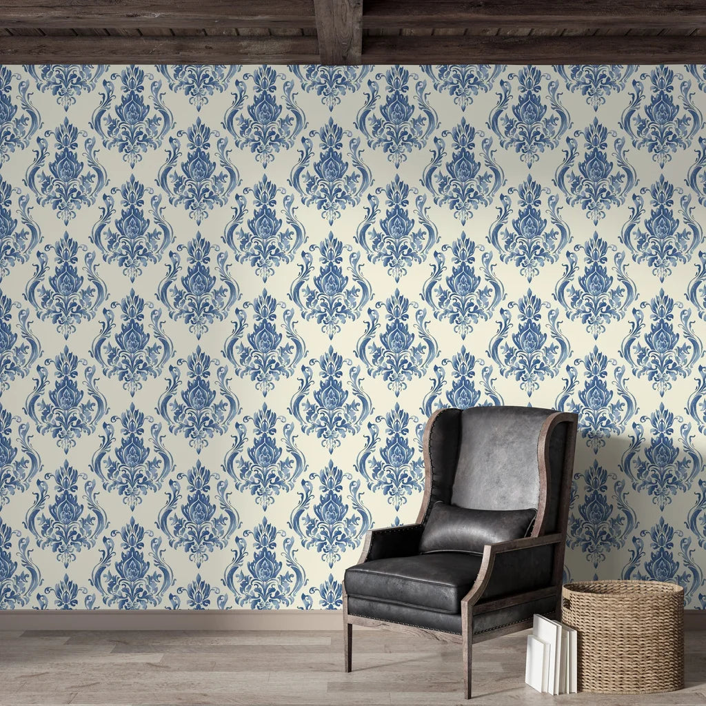 Blue and cream Sylvan Elegance damask wallpaper in rustic living room with leather chair