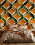 Tangerine Orbit vibrant orange geometric leaf wallpaper in a warm and inviting living room