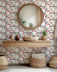 A white background with a distressed, floral design in shades of pink and green