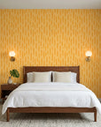 Tawny Rain golden brushstroke dash wallpaper adding character to a cozy bedroom