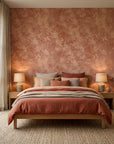 Terra Drift earthy abstract wallpaper adding character to a cozy bedroom