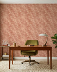Terra Drift earthy abstract wallpaper as a feature wall in a bright home office