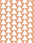Smooth peach and white geometric triangle peel and stick wallpaper - Terracotta Peaks