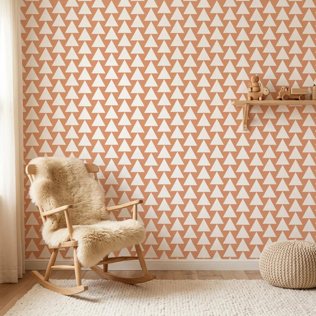 Terracotta Peaks geometric peach triangle wallpaper bringing warmth to a peaceful nursery